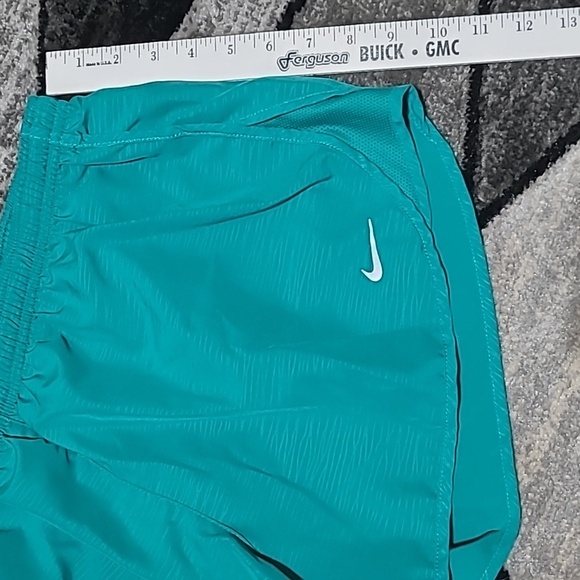 NIKE DRI-FIT REFLECTIVE SWOOSH LOGO LINED MESH ZIP POCKET ATHLETIC RUNNING SHORT - Picture 3 of 11